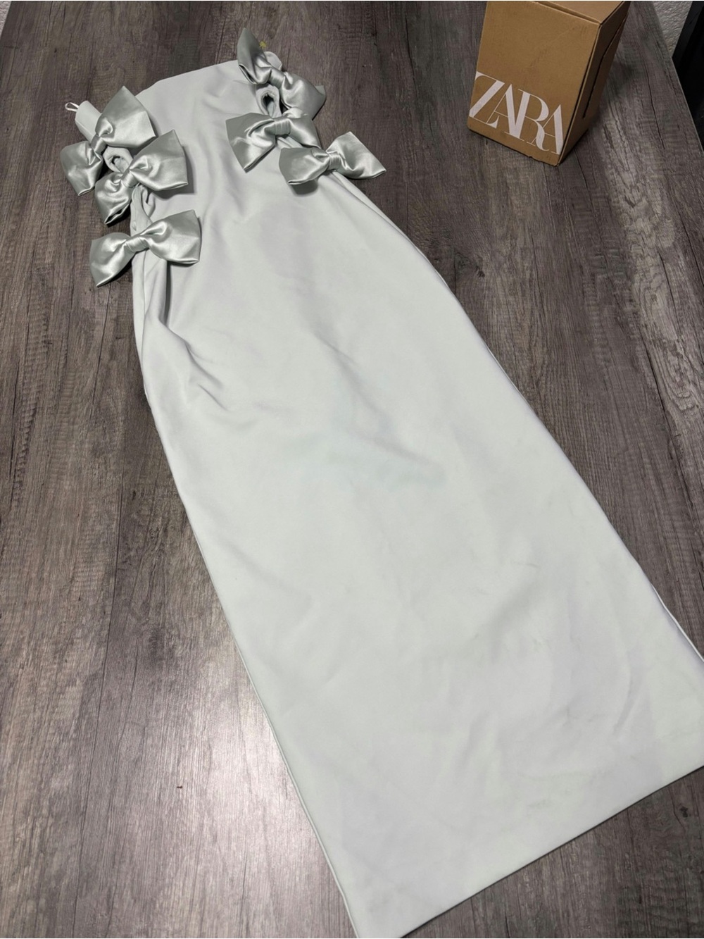 Zara One-Shoulder Dress with Bow Accents in Light Silver